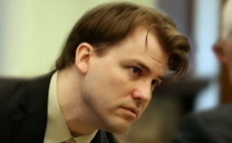 A worried looked Brett is in court.