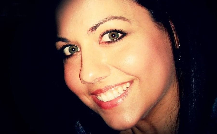 Close-up portrait of Vashti smiling.