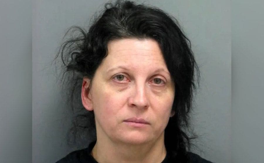 The police take a mug shot of Golyar after arresting her.