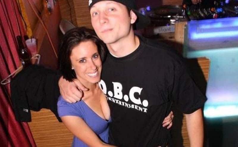 Casey Anthony smiles as he holds her boyfriend, Tony Lazaro, at a party. 