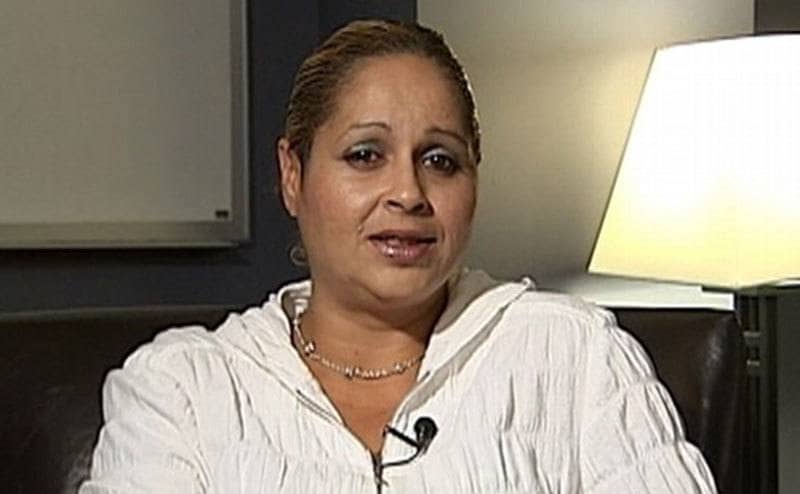 Zenaida Gonzales is talking in a televised interview. 