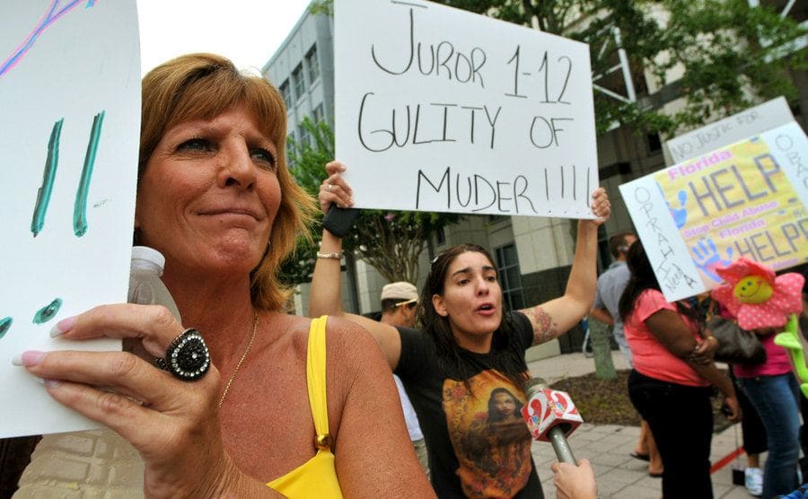 Protesters react outside the courthouse to the final nonguilty verdict.