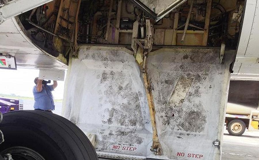 A view of the wheel well of a plane.