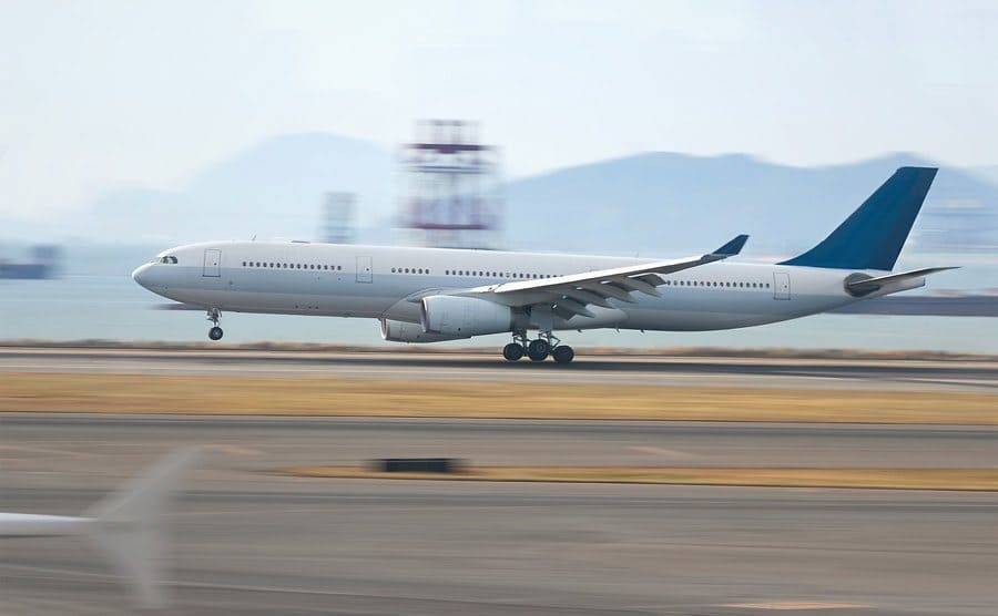 A passenger aircraft is landing at high speed.