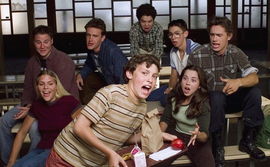 Sam Weir slips in the cafeteria in front of the rest of the cast, who laughs.