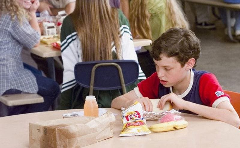 Sam Weir, played by Daley, sits alone in the cafeteria.