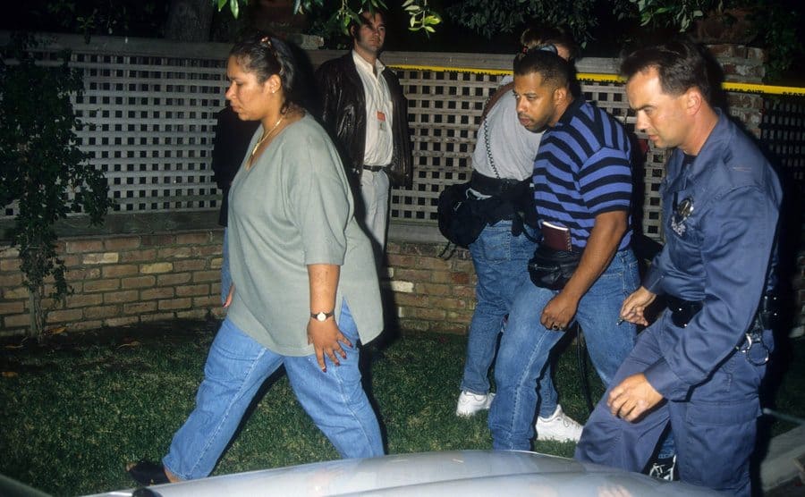 O.J. Simpson's sister walks near the crime scene.