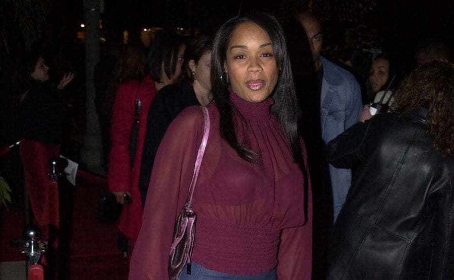 Arnelle Simpson poses for the press as she attends an event.