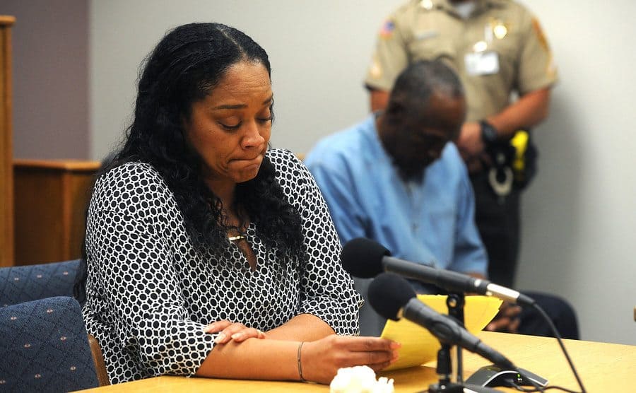 O.J. Simpson sits listening to his daughter testifying in court.