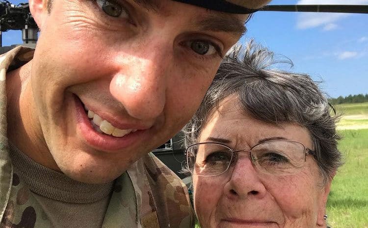 Lt. Colonel Kane takes a photo with his mother.