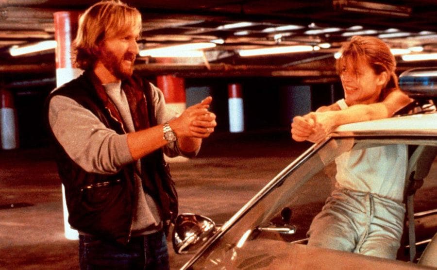 James Cameron gives direction to Linda Hamilton during filming.
