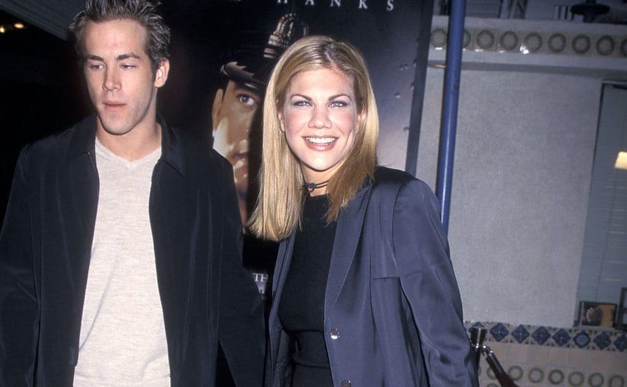Ryan Reynolds and Kristen Johnston attend a movie premiere.