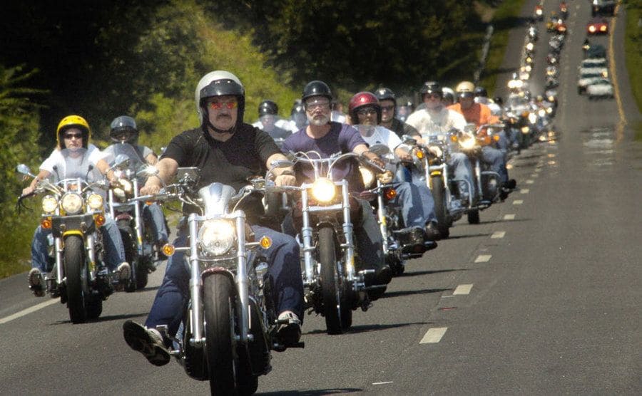 A line of motorcycles motor down during Jennifer’s memorial bike/car ride.