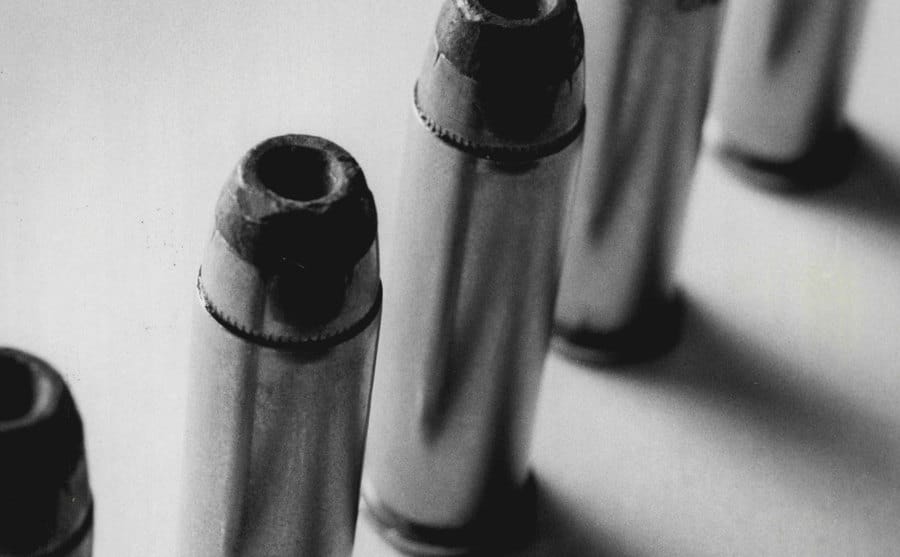 Bullets sit on a desk.