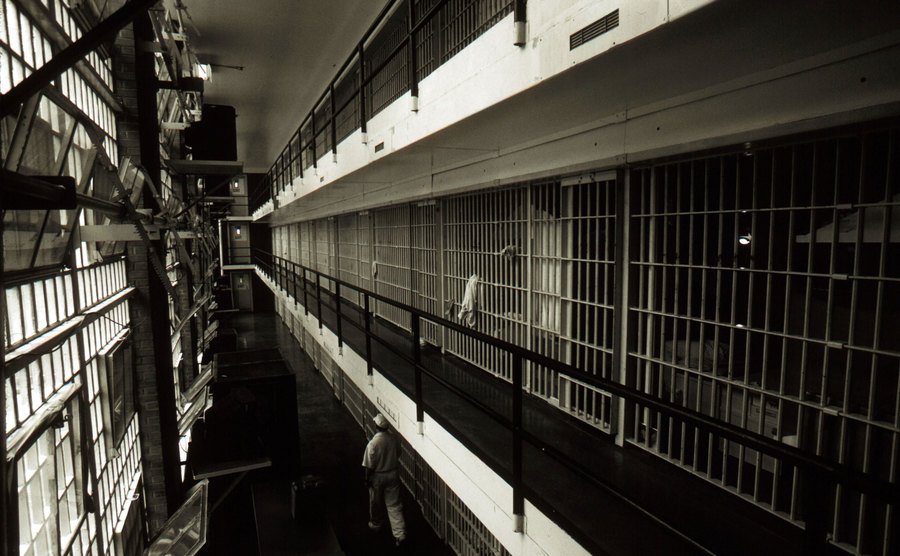 Prison cells line a hall at the death row unit.