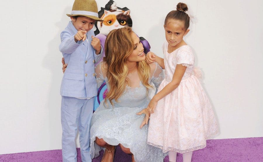 Jennifer Lopez and her children attend an event.