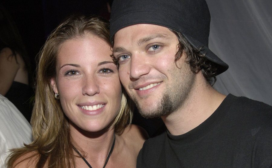 Missy Rothstein and Bam Margera standing closely together. 