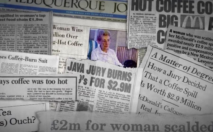 Various newspaper clippings on McDonald’s victims over a hot coffee.