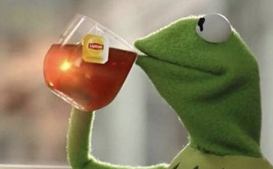 Kermit enjoys drinking his tea.