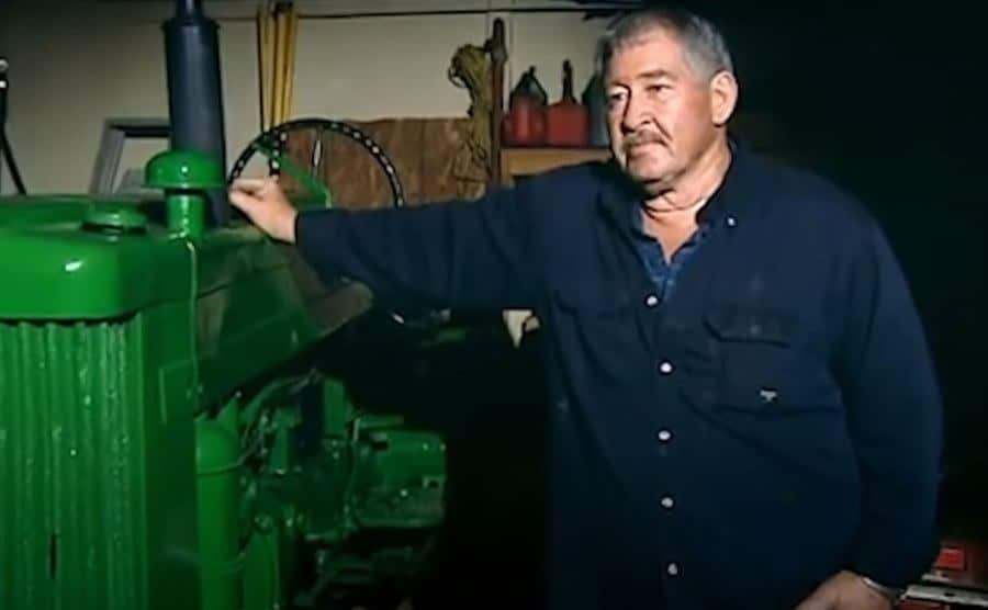 Al stands in his garage during an interview.
