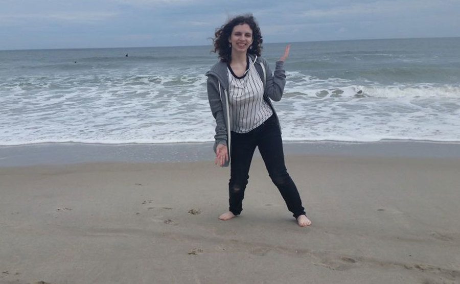 A portrait of Hailey by the beach.