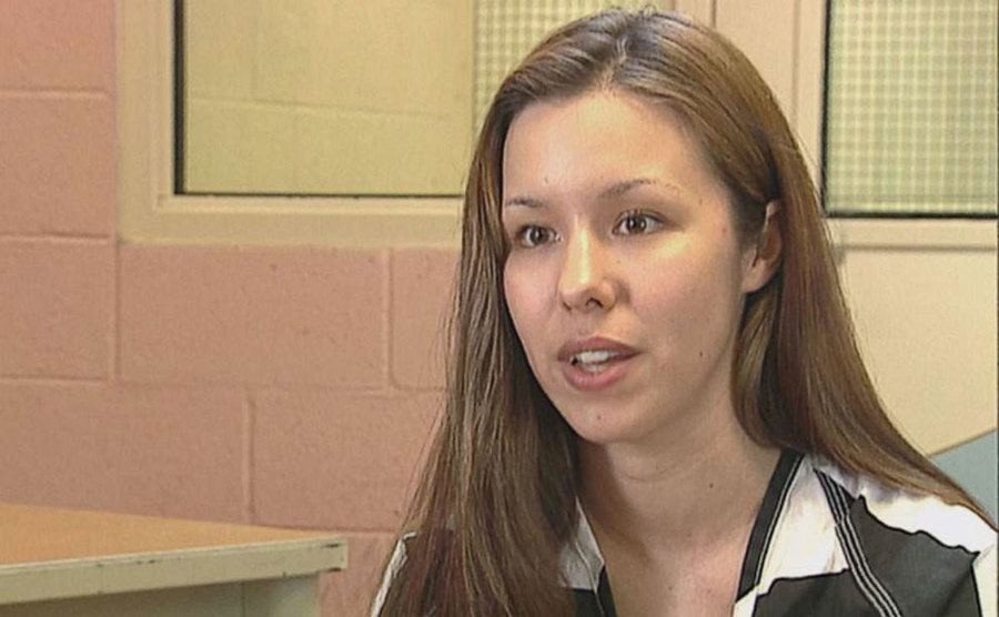 Jodi Arias sits in the interrogation room.