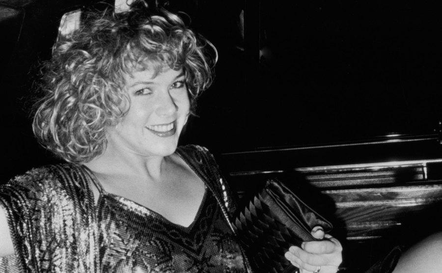A portrait of Kathleen Turner.