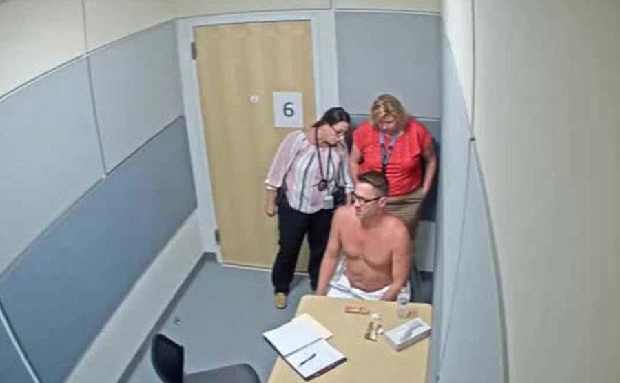A detective is interrogating Dave at police headquarters.