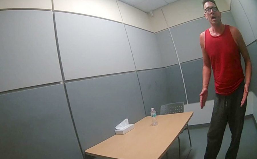 A still from Dave in the interrogation room.