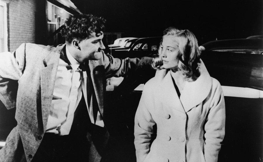 Randy Quaid and Cybill Shepherd talk in a still from 'The Last Picture Show.'