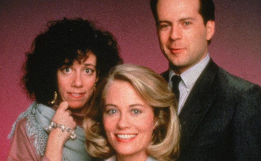 Allyce Beasley, Cybill Shepherd, and Bruce Willis pose for a studio portrait.