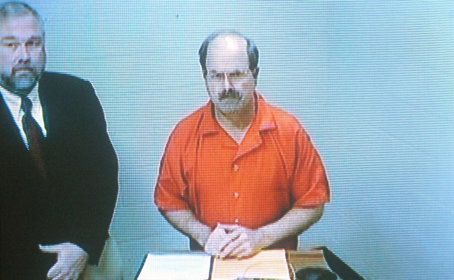 The BTK Killer on a video screen in his first court appearance.