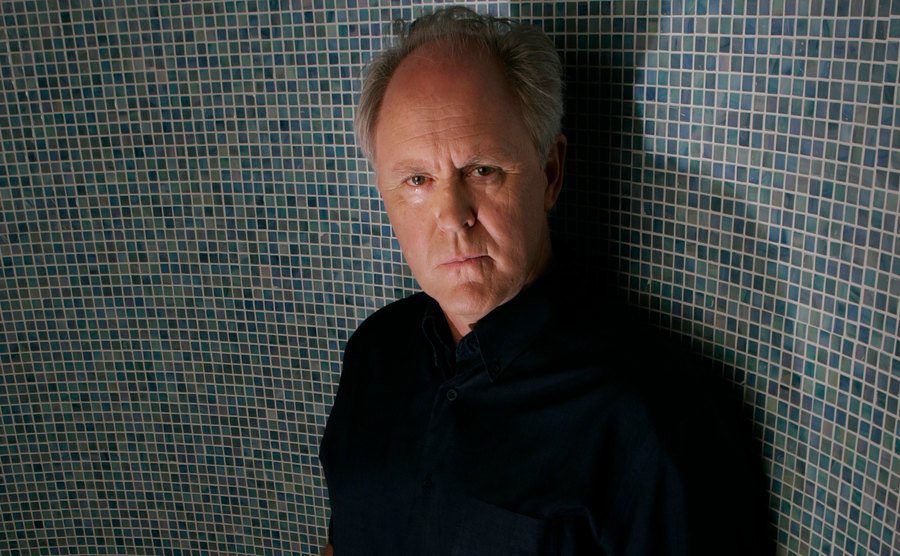 A portrait of John Lithgow.