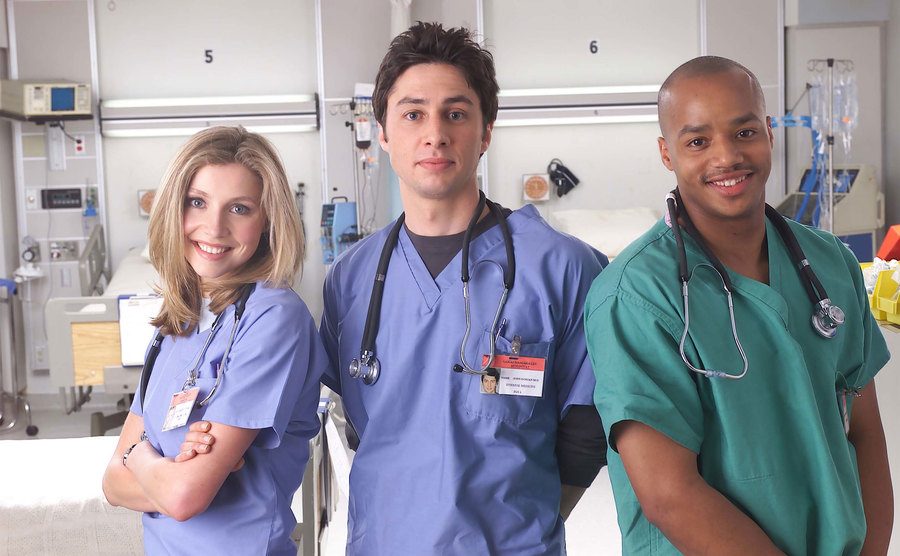 Sarah Chalke, Zach Braff, and Donald Faison pose for the show