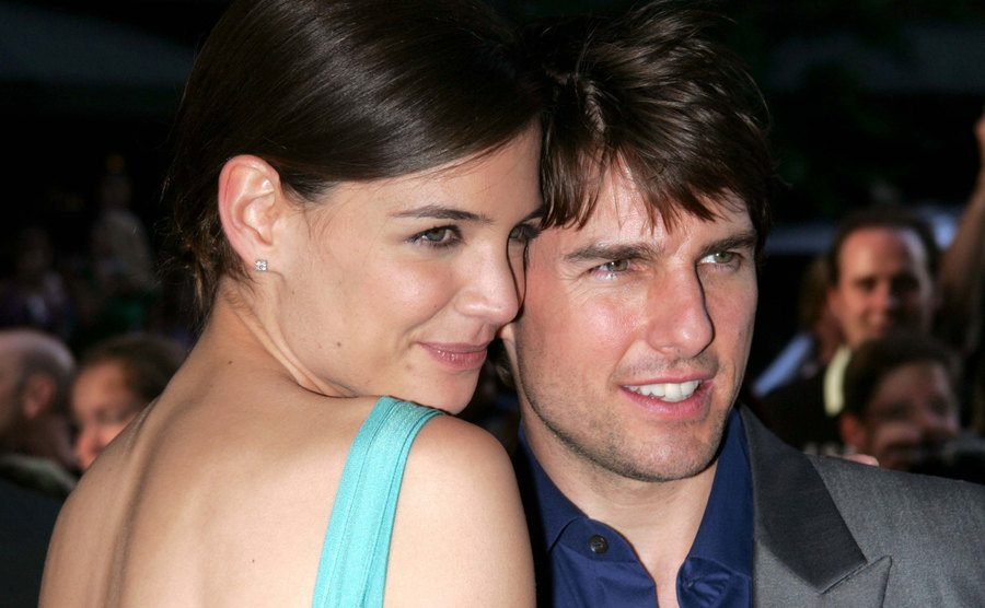 Katie Holmes and Tom Cruise attend an event.