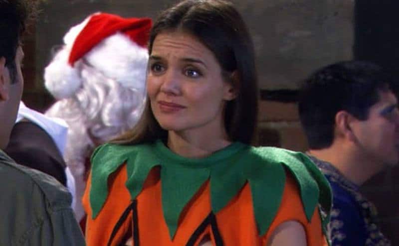 Holmes dresses as a pumpkin in a still from the show.