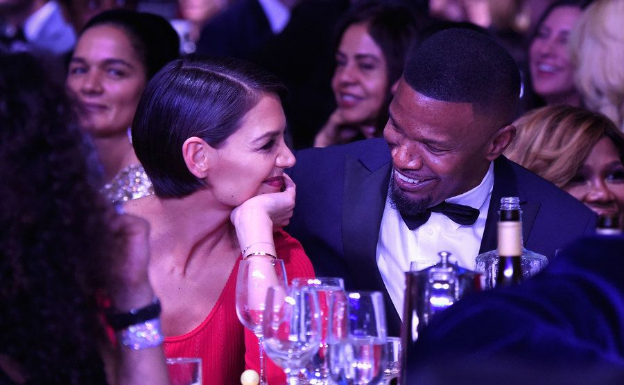 Katie Holmes and Jamie Foxx attend an event.