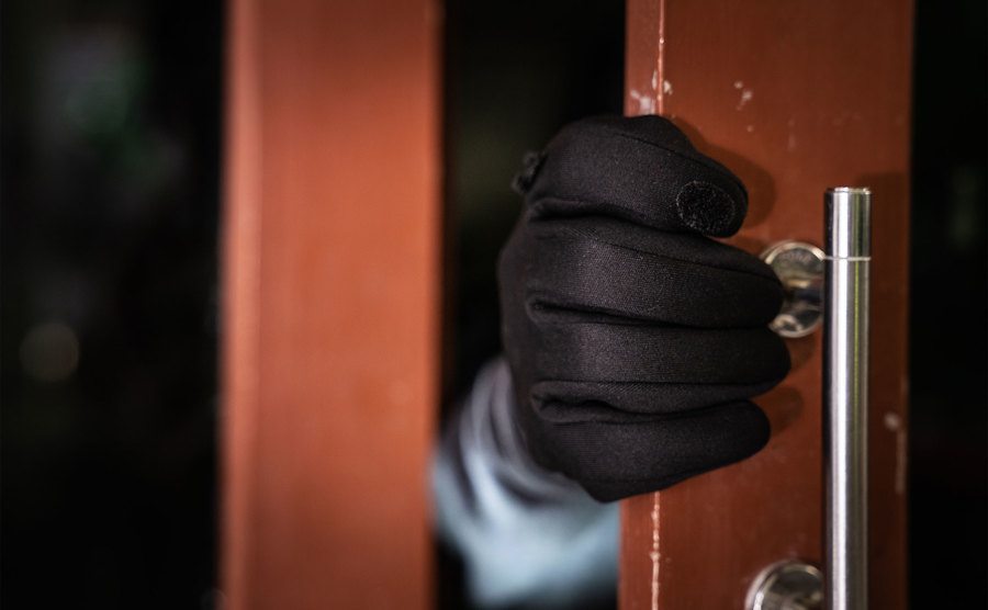 A man breaks into a victim's home. 