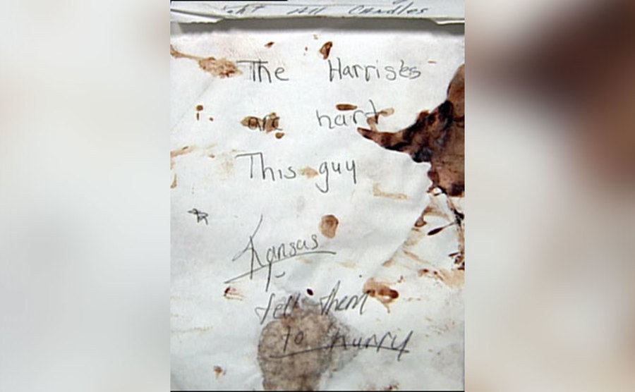 A note Krystal wrote that says, “The Harrises are hurt This guy. Tell them to hurry.”