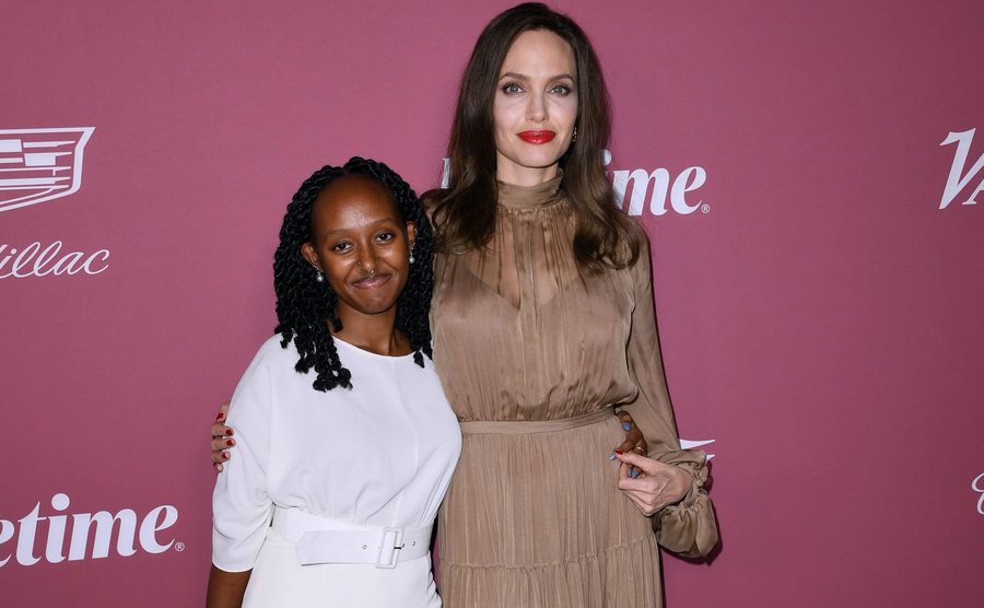 Zahara Marley and Angelina pose for the press.