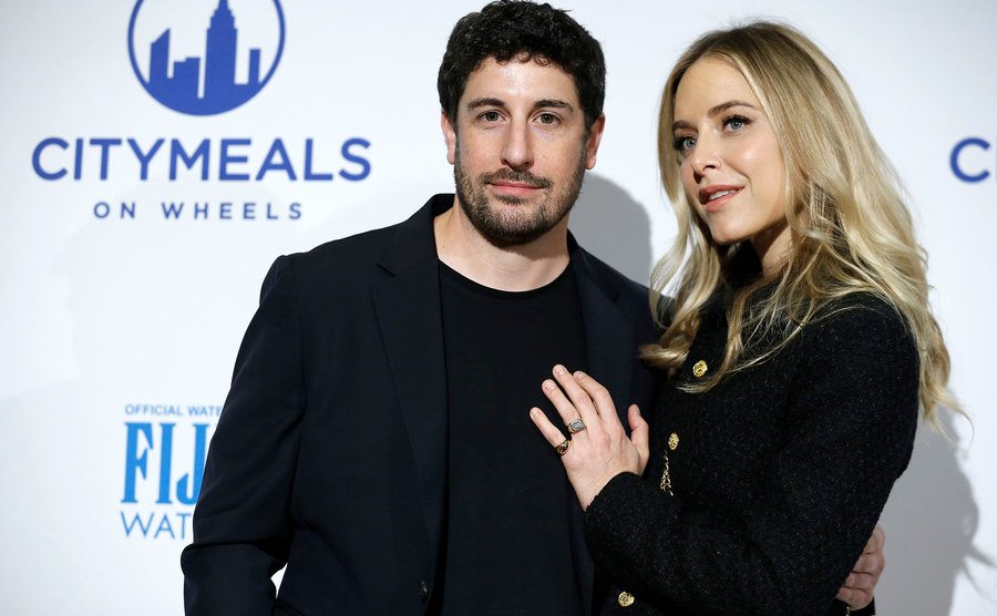 Jason Biggs and Jenny Mollen attend an event.