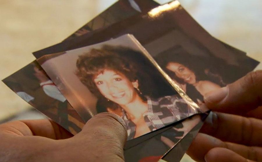 Dee Dee’s son holds a dated picture of his mother.