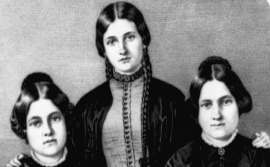 A portrait of the Fox sisters.