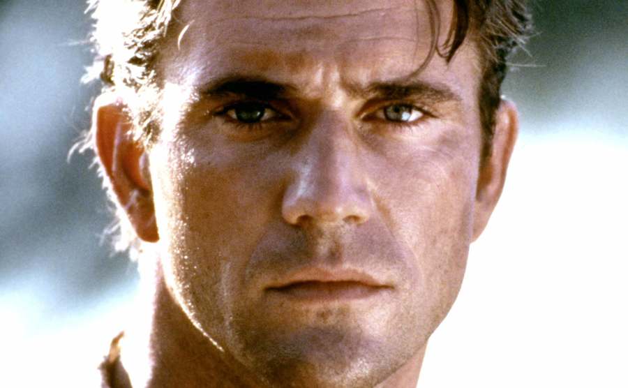 A portrait of Mel Gibson on a movie set.
