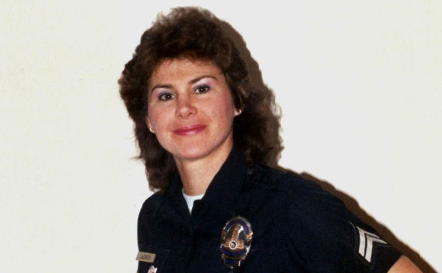 Stephanie Lazarus poses in her police uniform.