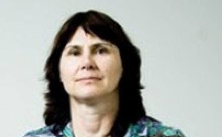 A close-up portrait of Stephanie Lazarus.