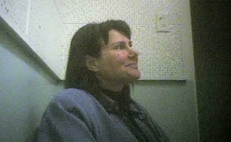 Stephanie Lazarus sits in the interrogation room.
