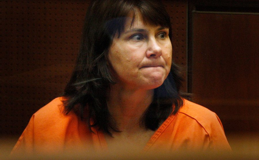 Stephanie Lazarus looks frustrated while sitting in court.