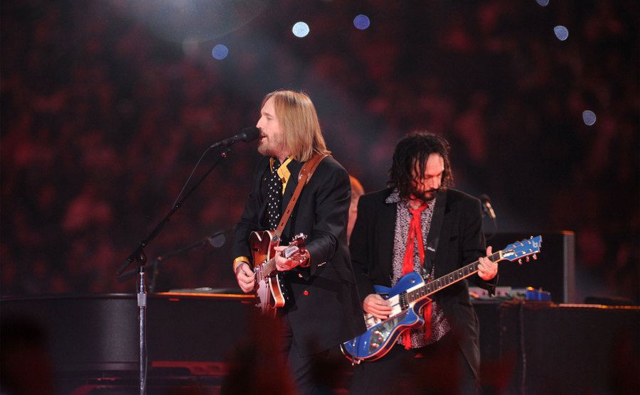 Tom Petty & The Heartbreakers perform during the 'Bridgestone Halftime Show'.