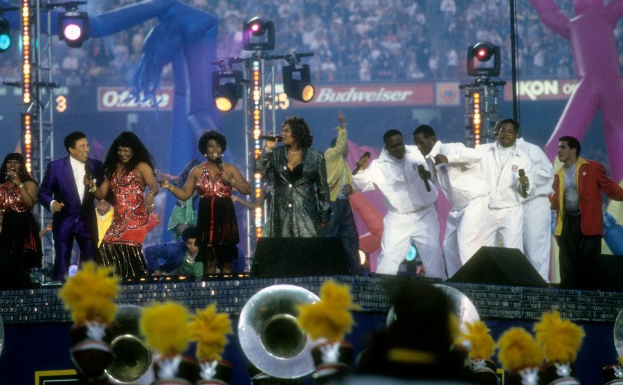 Queen Latifah, Smokey Robinson, Martha Reeves, and Boyz II Men perform at The Halftime Show.